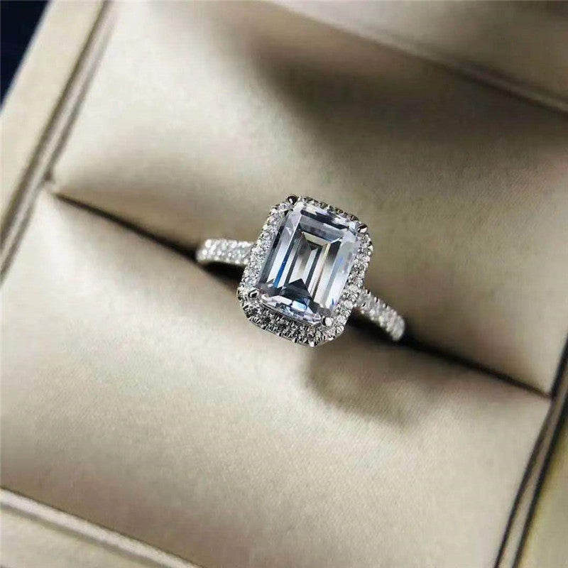 "Saria" Emerald Cutter Proposes And Engages Moissanite Diamond Ring